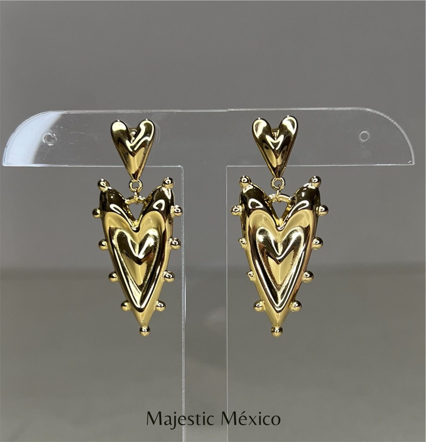 ARETES LARGOS CORAZÓN DUAL TEXTURIZADO