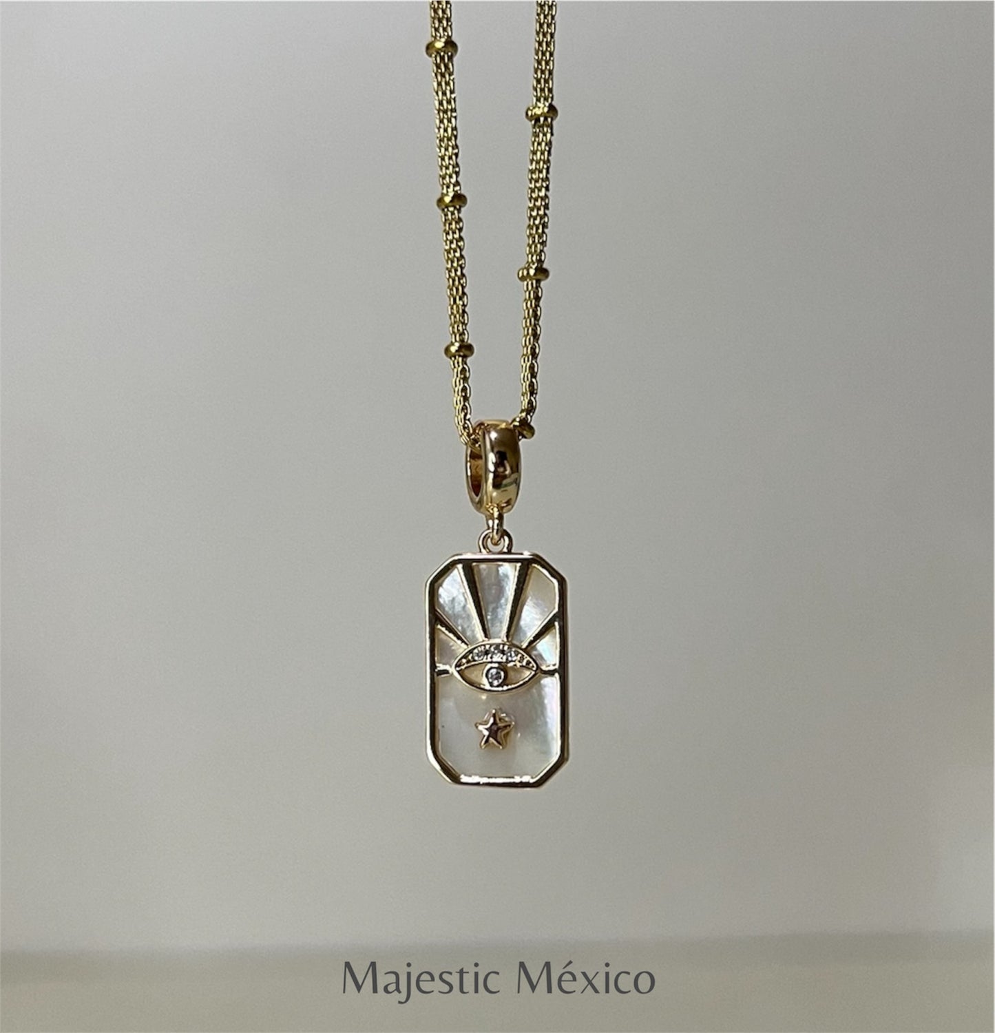 COLLAR OJITO CON ZIRCONIA Y MADRE PERLA