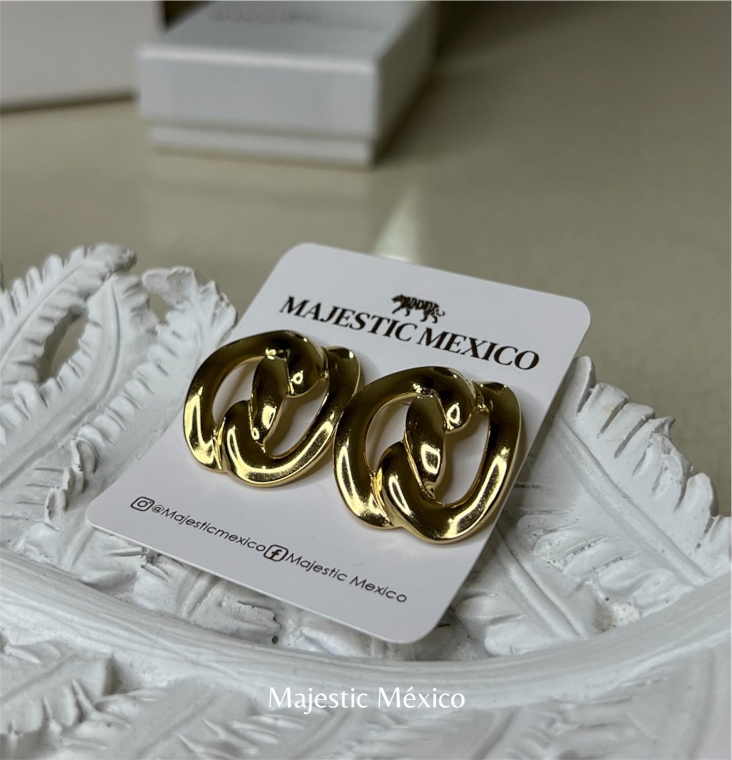 ARETES DE AROS ENTRELAZADOS