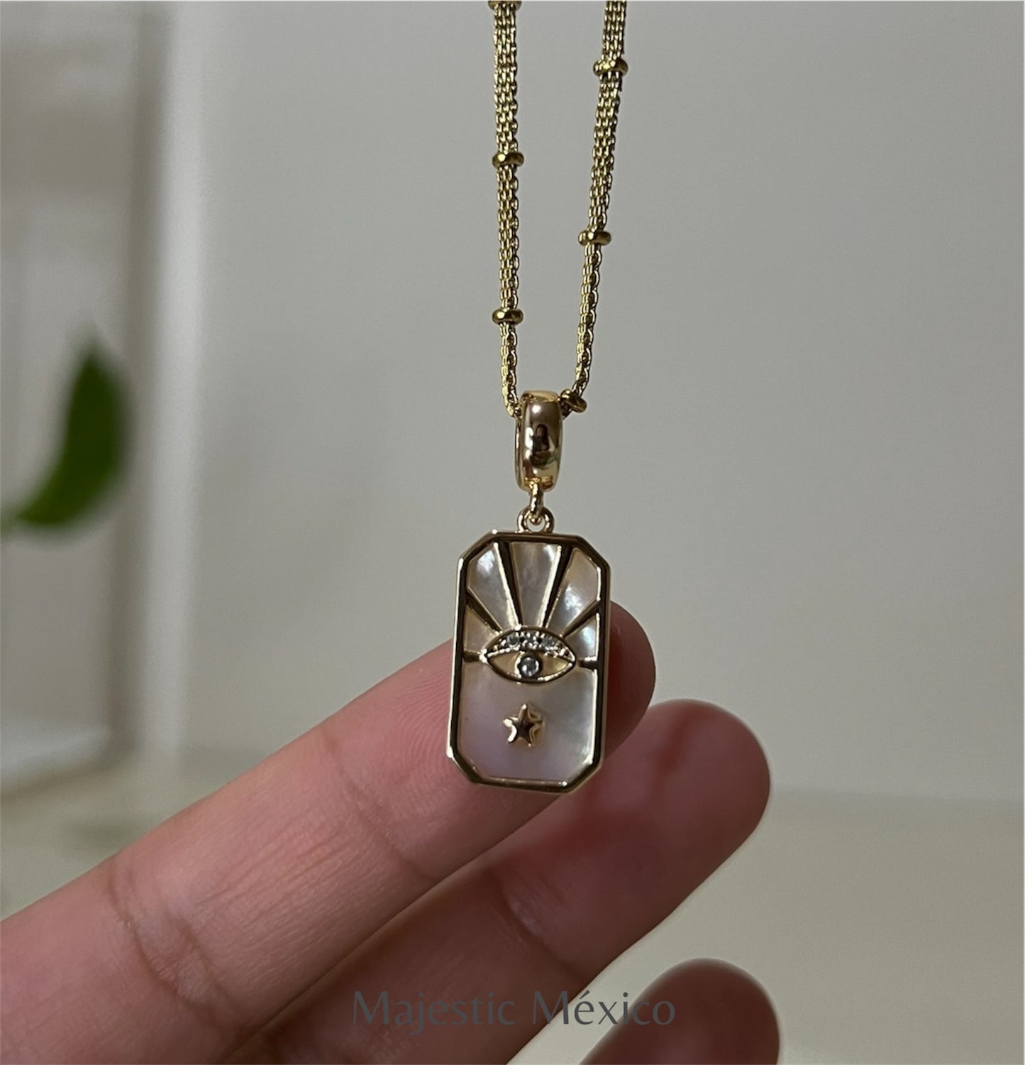 COLLAR OJITO CON ZIRCONIA Y MADRE PERLA